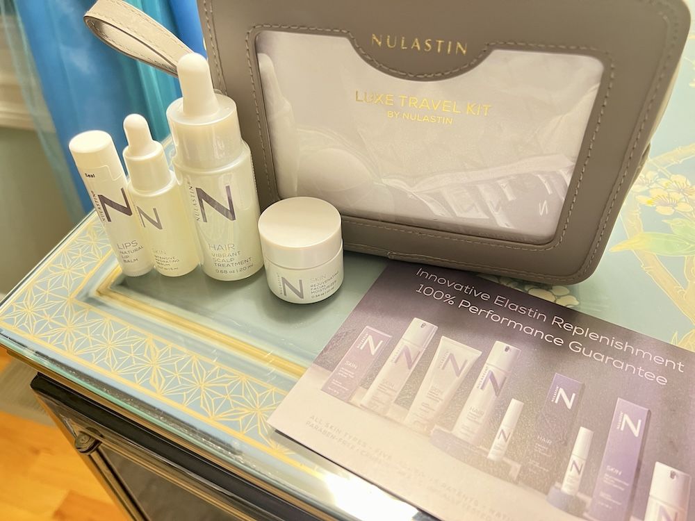 Nulastin Luxe Travel Kit products, info card and case