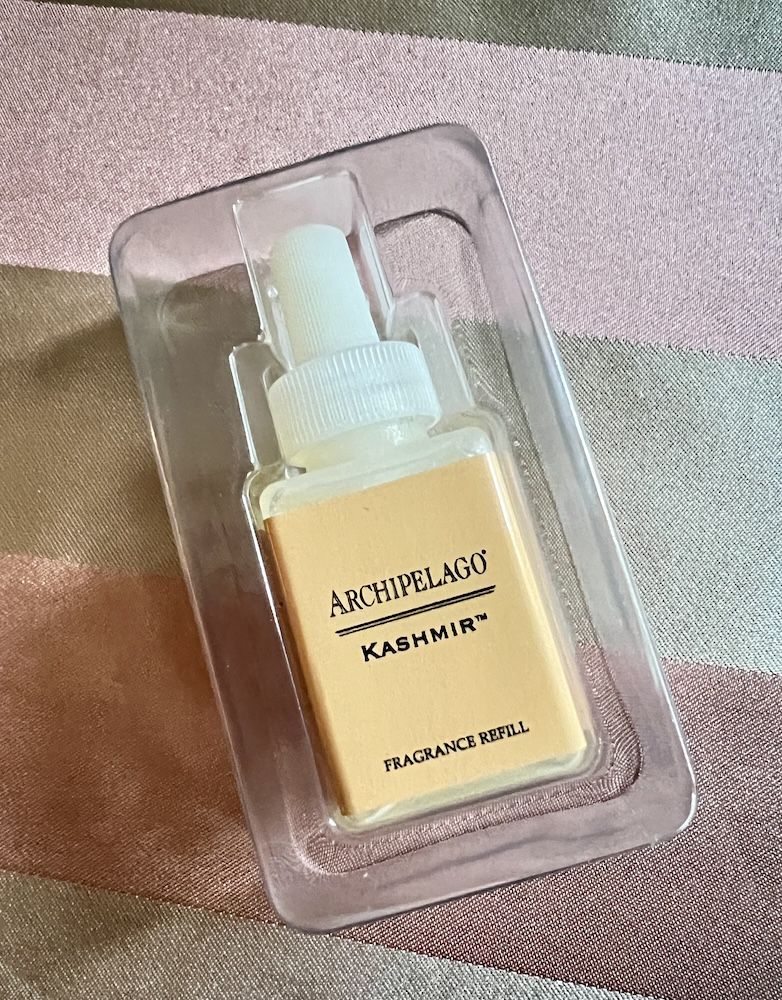 bottle of Pura Kashmir Fragrance Refill for a scent diffuser